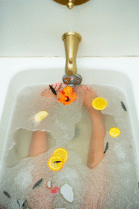 A woman’s legs in a bathtub