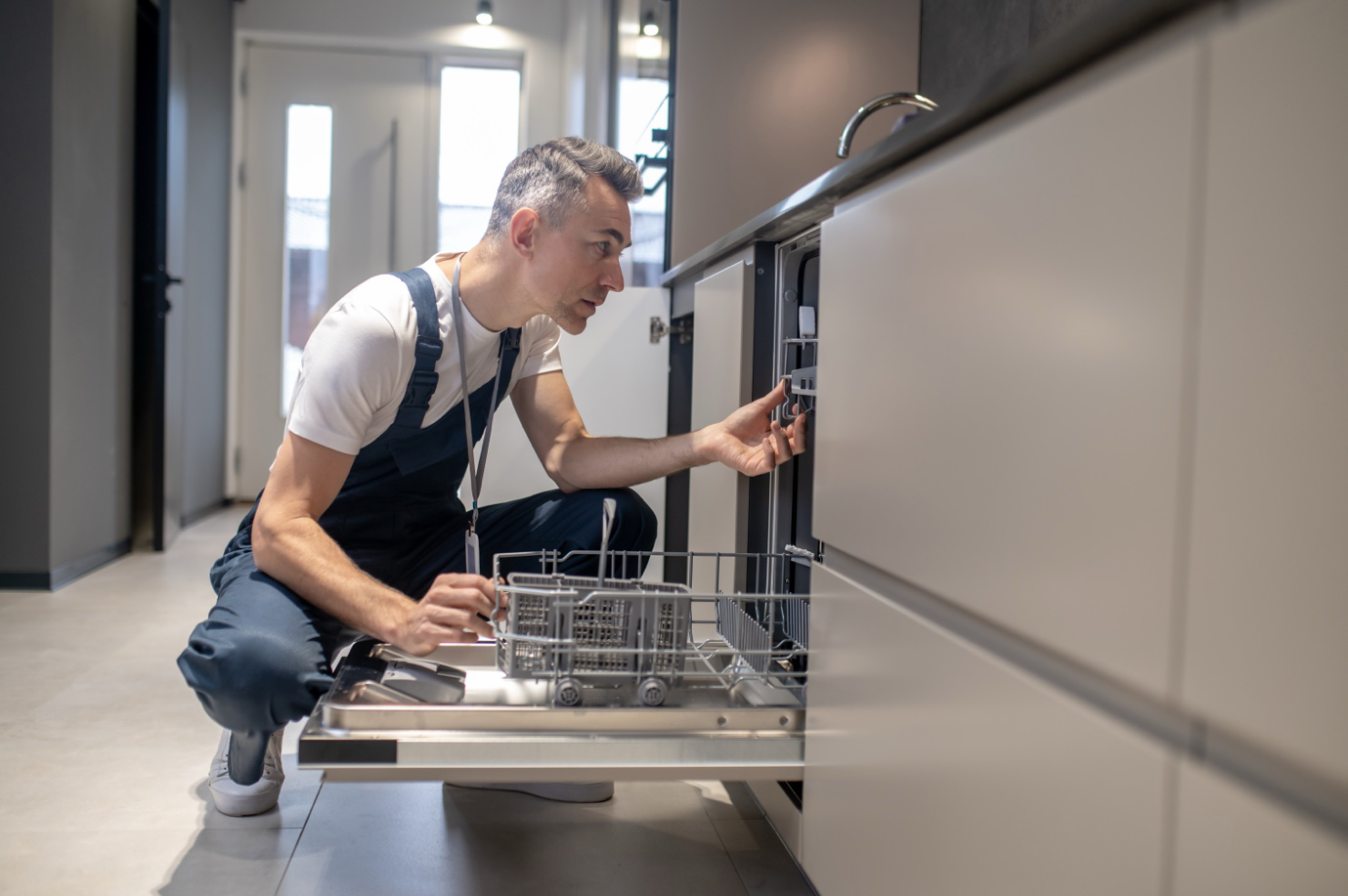 Dishwasher being professionally installed during a kitchen renovation in Brockton